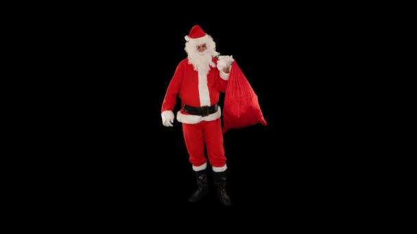 Kerstman Met Een Zak Vol Cadeautjes Die Magisch Poeder Uit — Stockvideo