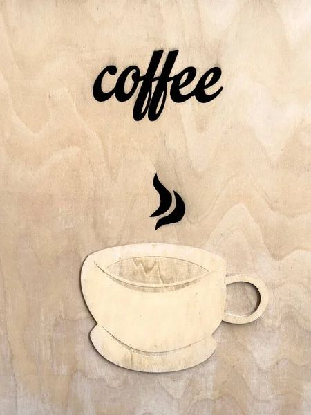 coffee, cup or mug of coffee icon carved on wooden background or surface with copy space. cafe shop menu. cafe shop background or surface with wooden carved cup or mug poster