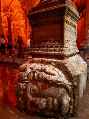 Medusa, closeup selective focused head of medusa, ancient ant  stone statue in Basilica Cistern in Istanbul, Turkey. travel destinations landmarks background or surface. Basilica Cistern in Turkey