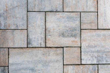 Zemin, duvar veya yol için beton veya arnavut kaldırımgri kaldırım levhalar veya taşlar. Geleneksel mahkeme, arka bahçe veya yol döşeme. Soyut arka plan