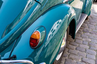 Rear wing of a vintage retro car close-up