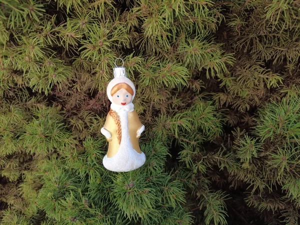 toy snowman. snow woman. New Year. Christmas fairy. Christmas tree. vintage christmas toys. Snowman and christmas balls on snow. winter holidays.