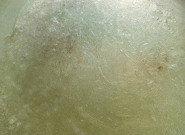 Buz dokusu. Donmuş su. Sudaki hava kabarcıkları. Sudaki donmuş hava. Şeffaf buz kristalleri doku çatlağı arka planı. Kış dönemi. Soyut kış geçmişi. Doku arkaplanı.