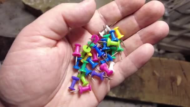 Colored Push Pins Hand Office Supplies Footage — Vídeos de Stock