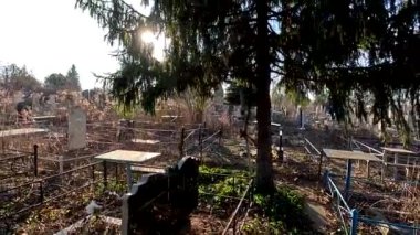 Ukrina. January 11, 2023. Old cemetery. Abandoned graves. Broken headstones. Fresh graves. footage in high quality. 4k video