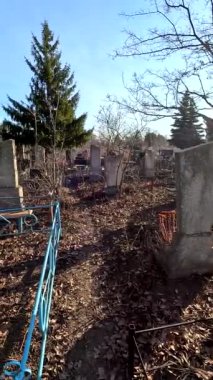 Ukrina. January 11, 2023. Old cemetery. Abandoned graves. Broken headstones. Fresh graves. footage in high quality. 4k video