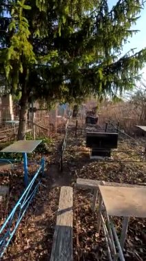 Ukrina. January 11, 2023. Old cemetery. Abandoned graves. Broken headstones. Fresh graves. footage in high quality. 4k video