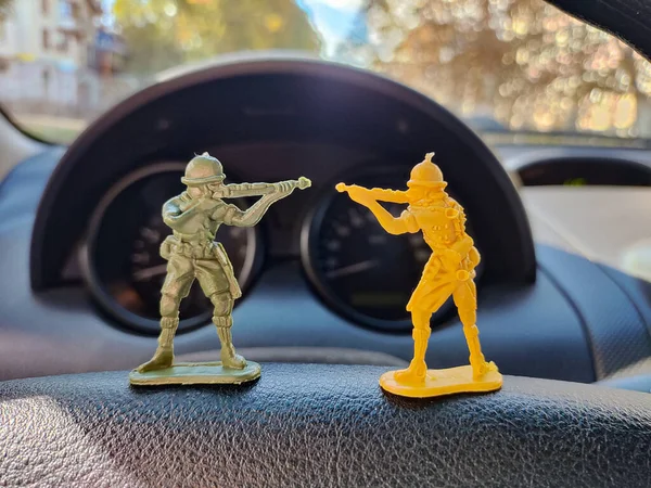 toy soldiers. war. soldier with weapons. injury and death in war. symbols of military action. battlefield. toy army.