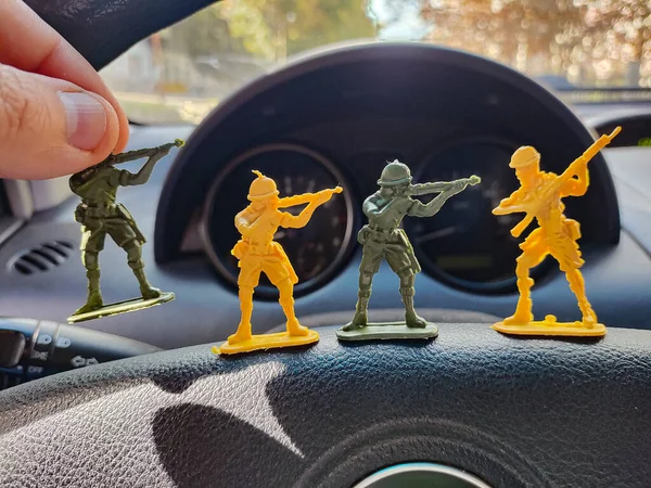 toy soldiers. war. soldier with weapons. injury and death in war. symbols of military action. battlefield. toy army.