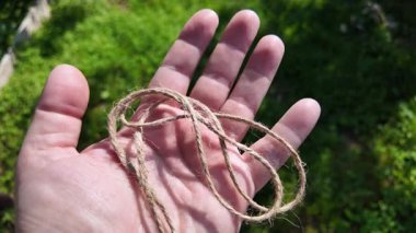 Felaket. Doğal Jute Twine dokusu. Doğal jüt sicimin yüksek çözünürlüklü dokusu pürüzlü liflerini ve organik dokumasını gösteriyor. Elde bela. Jute çuval bezi rustik ip ipi ipi ipi.