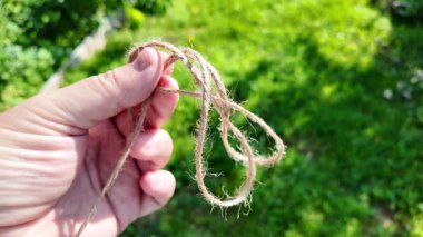Felaket. Doğal Jute Twine dokusu. Doğal jüt sicimin yüksek çözünürlüklü dokusu pürüzlü liflerini ve organik dokumasını gösteriyor. Elde bela. Jute çuval bezi rustik ip ipi ipi ipi.