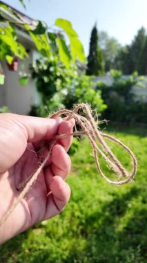 Felaket. Doğal Jute Twine dokusu. Doğal jüt sicimin yüksek çözünürlüklü dokusu pürüzlü liflerini ve organik dokumasını gösteriyor. Elde bela. Jute çuval bezi rustik ip ipi ipi ipi.