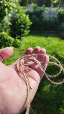 Felaket. Doğal Jute Twine dokusu. Doğal jüt sicimin yüksek çözünürlüklü dokusu pürüzlü liflerini ve organik dokumasını gösteriyor. Elde bela. Jute çuval bezi rustik ip ipi ipi ipi.