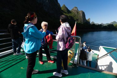 Li River, YangShou, Guangxi Province, China 23 October 2024, Li River Cruise is an unforgettable to experience the beauty of the Li river amongst the Guilin Karst Mountains. clipart