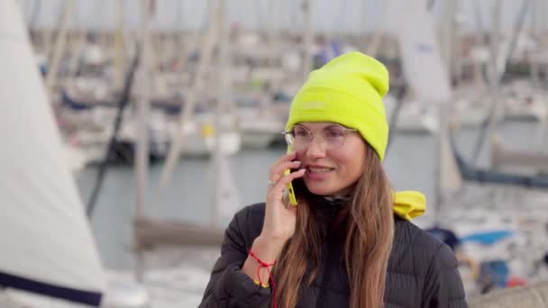 Cold Weather Sea Girl Walks Background Yachts Warm Clothes — Video