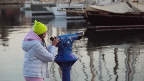 Girl Looks Telescope Marina Cool Evening Yachts — Video Stock
