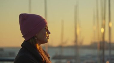 Profile of the girl on the background of the masts. High quality 4k footage