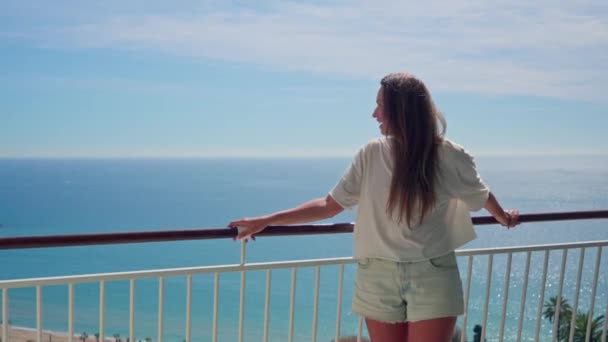 Woman Standing Balcony Overlooking Ocean — Stock Video