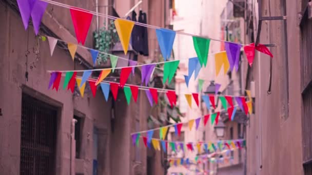 Narrow City Street Colorful Flags Hanging Buildings — Stock Video