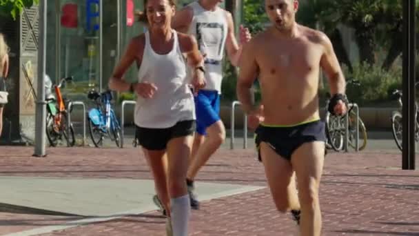 Group People Running Sidewalk — Stock Video