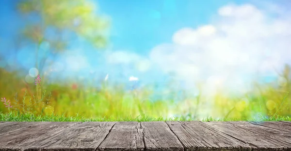 Wooden Table Blurred Spring Landscape Background Flowers Grass — Stock Photo, Image