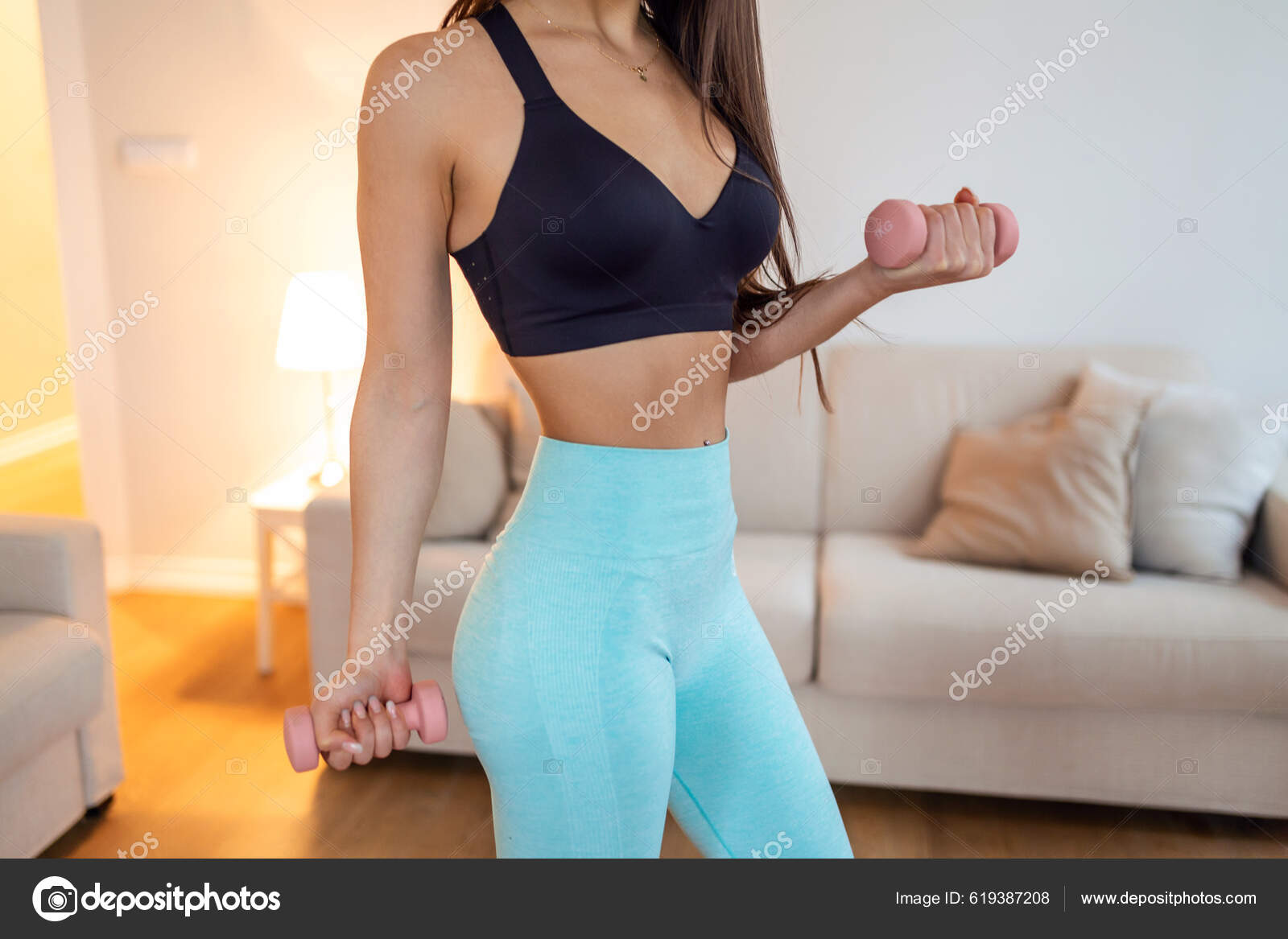 Athletic woman doing exercise for arms. Fitness model working out