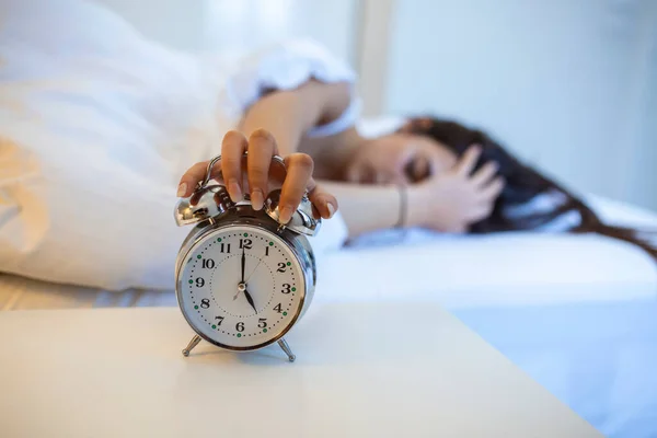 Woman Lying Bed Turning Alarm Clock Morning 5Am Hand Turns — Stock Photo, Image