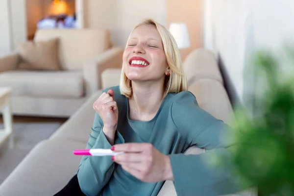 Young Happy Woman Holding Positive Pregnancy Test Shallow Depth Field — 스톡 사진