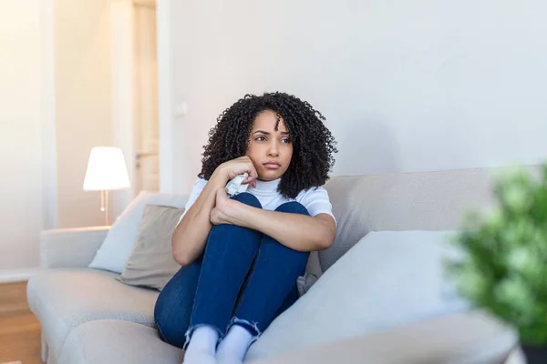 stock image Young African American woman feeling upset, sad, unhappy or disappoint crying lonely in her room. Woman Suffering From Depression Sitting On Bed And Crying