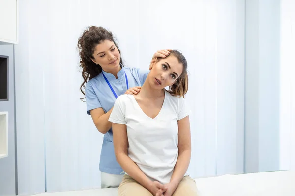 Female Physiotherapist Chiropractor Adjusting Patients Neck Physiotherapy Rehabilitation Concept White — Stock Photo, Image