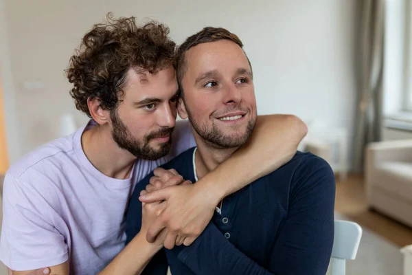 stock image Two young man lgbtq gay couple dating in love hugging enjoying intimate tender sensual moment together kissing with eyes closed
