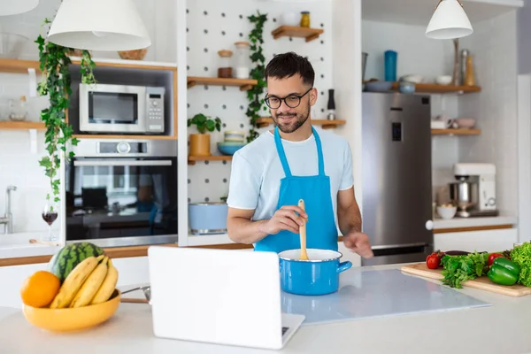 Young Man Spends Day Home Prepares Food Vegetables Kitchen Man — Stock Photo, Image