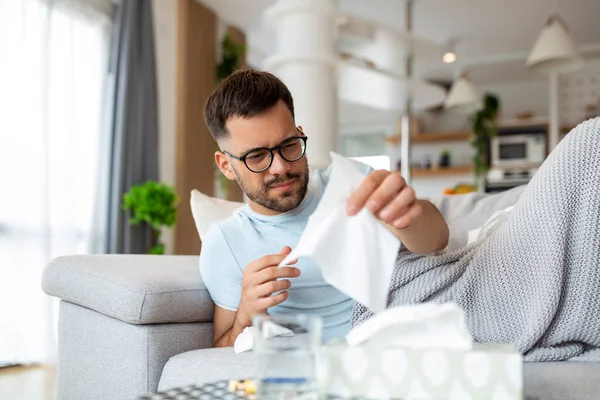 Sick Sad Man Glasses Sits Couch Home Suffers Runny Nose — Stock Photo, Image