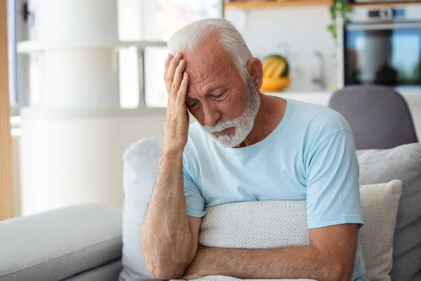 Headache Senior Man Suffering Migraine Pain Massaging Temples Sitting Home — Stock Photo, Image