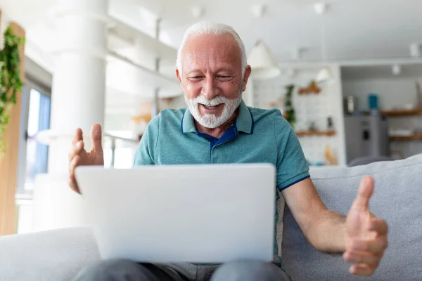 Elderly Man Seated Couch Looking Laptop Screen Scream Joy Feels — Stock Photo, Image