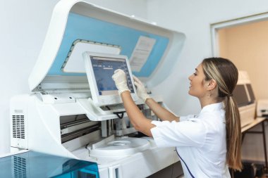 Female Scientist Working in The Lab, Using Computer Screen