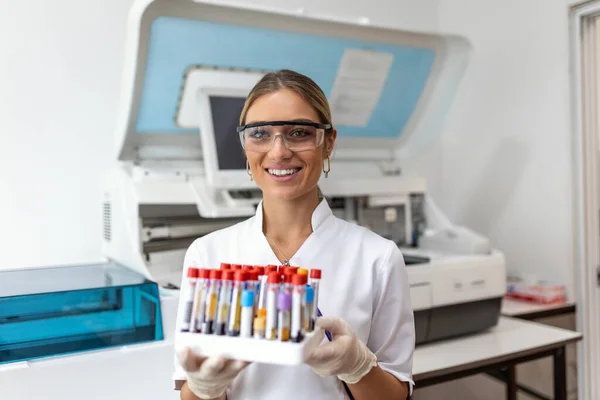 Blood Test Tubes Female Scientist Examining Blood Test Tubes Her — Stock fotografie