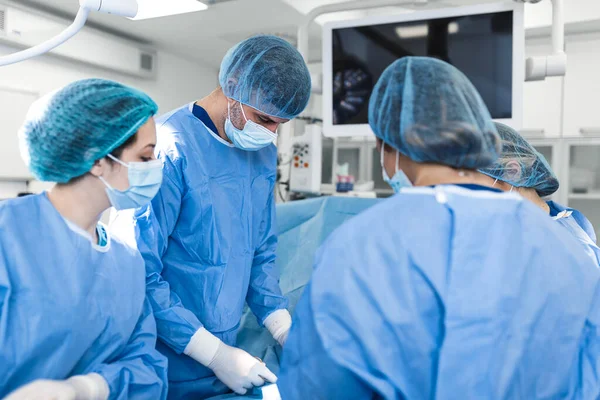 Urgent Surgery Professional Smart Intelligent Surgeons Standing Patient Performing Operation — Stock Photo, Image