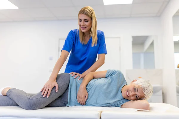 Professional Chiropractor Physiotherapist Helps Heal Senior Woman Back Doctor Fixes — Stock Photo, Image