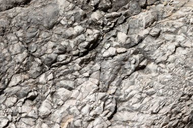 Gri kaba taş doku, arka plan olarak kullanılabilir