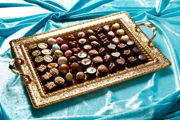 Gift chocolate tray. Sweets background.
