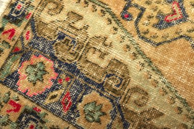 Textures and patterns in color from woven carpets clipart
