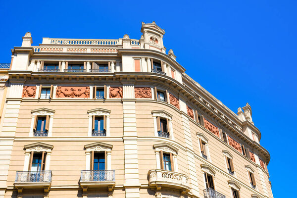Barcelona, Spain - March 25, 2023: A detailed view of the architecture of the buildings in the center of Barcelona