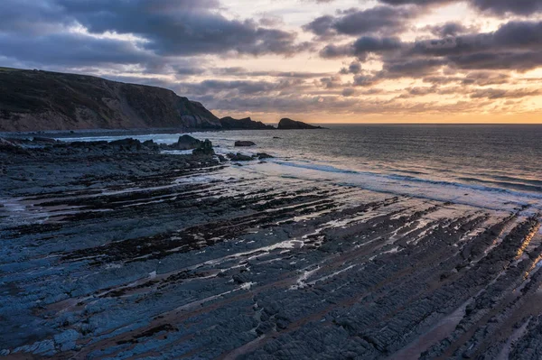 Schöne Drohnenlandschaft Sonnenuntergang Bild Von Welcombe Mouth Beach Devon England — Stockfoto