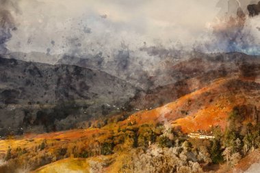 Güzel kış gündoğumu altın saat manzarası Loughrigg 'den kırsal alana doğru düştü Göl Bölgesi' ndeki Langdale Pikes 'e doğru