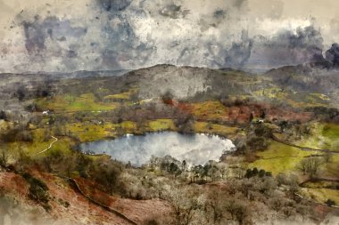 Güzel kış gündoğumu altın saat manzarası Loughrigg 'den Göl Bölgesi kırsalına düştü.