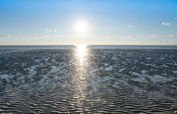 Ebb in the North Sea in Sank-Peter-Ording, Germany