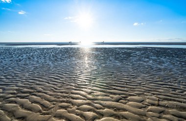 Ebb in the North Sea in Sank-Peter-Ording, Germany