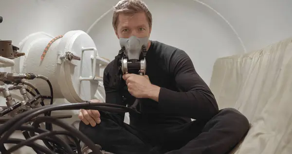 stock image Military man receiving treatment in industrial hyperbaric chamber closeup