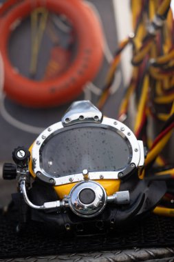Close up photo of commercial diving helmet clipart